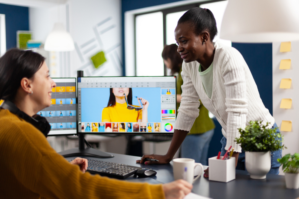 image of people around a computer