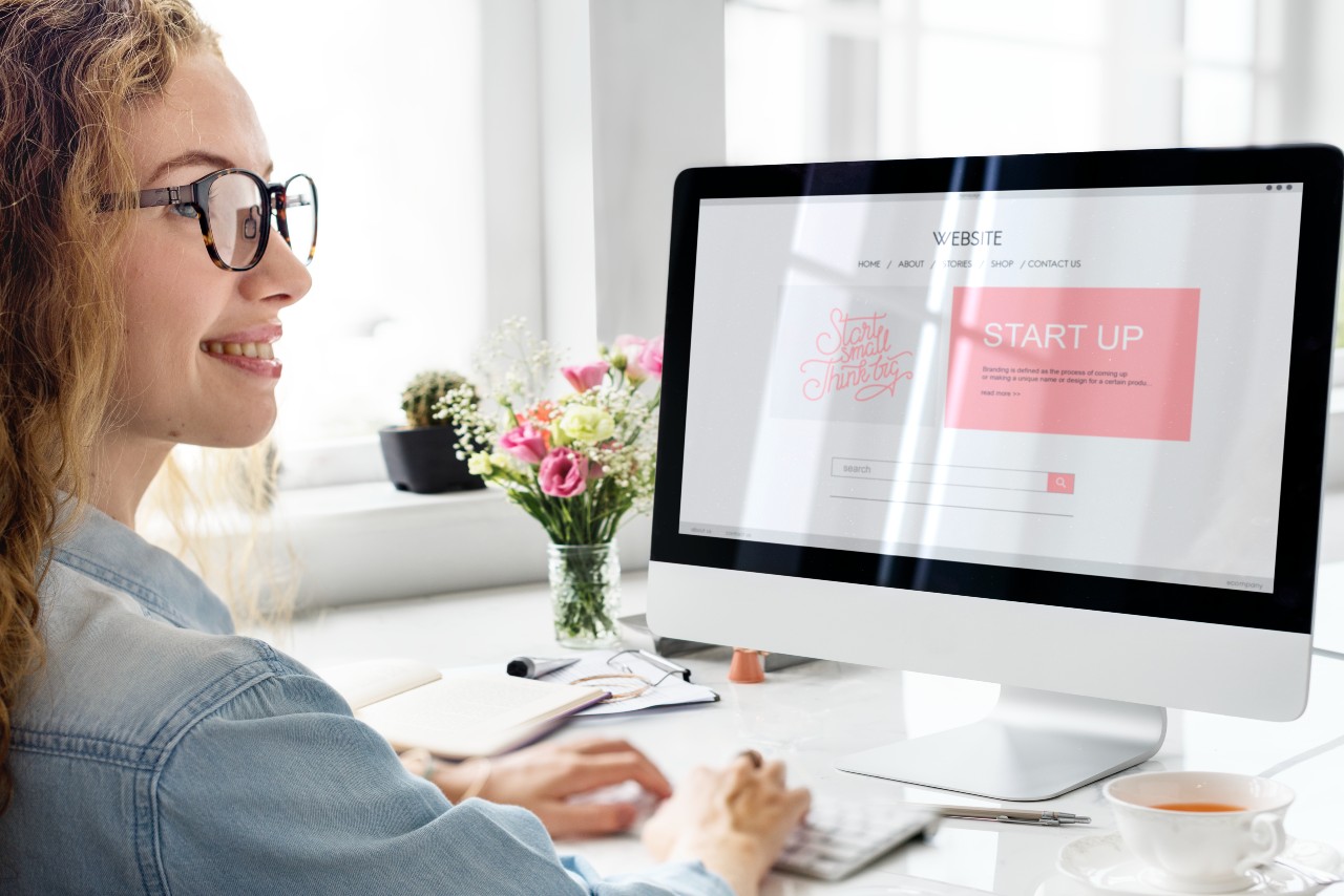 image or woman at computer